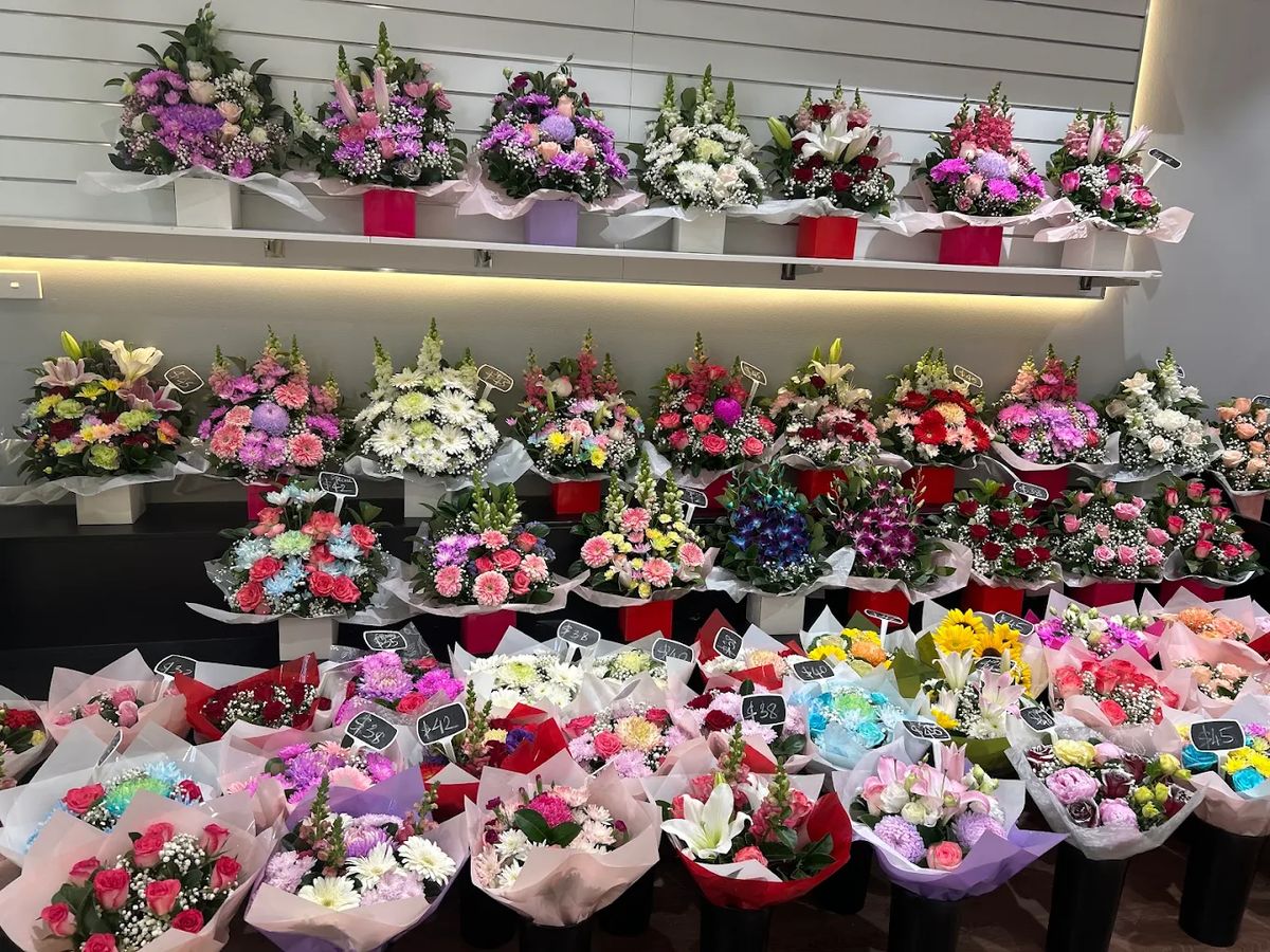 A wall of ready-made bouquets and arrangements in the shop